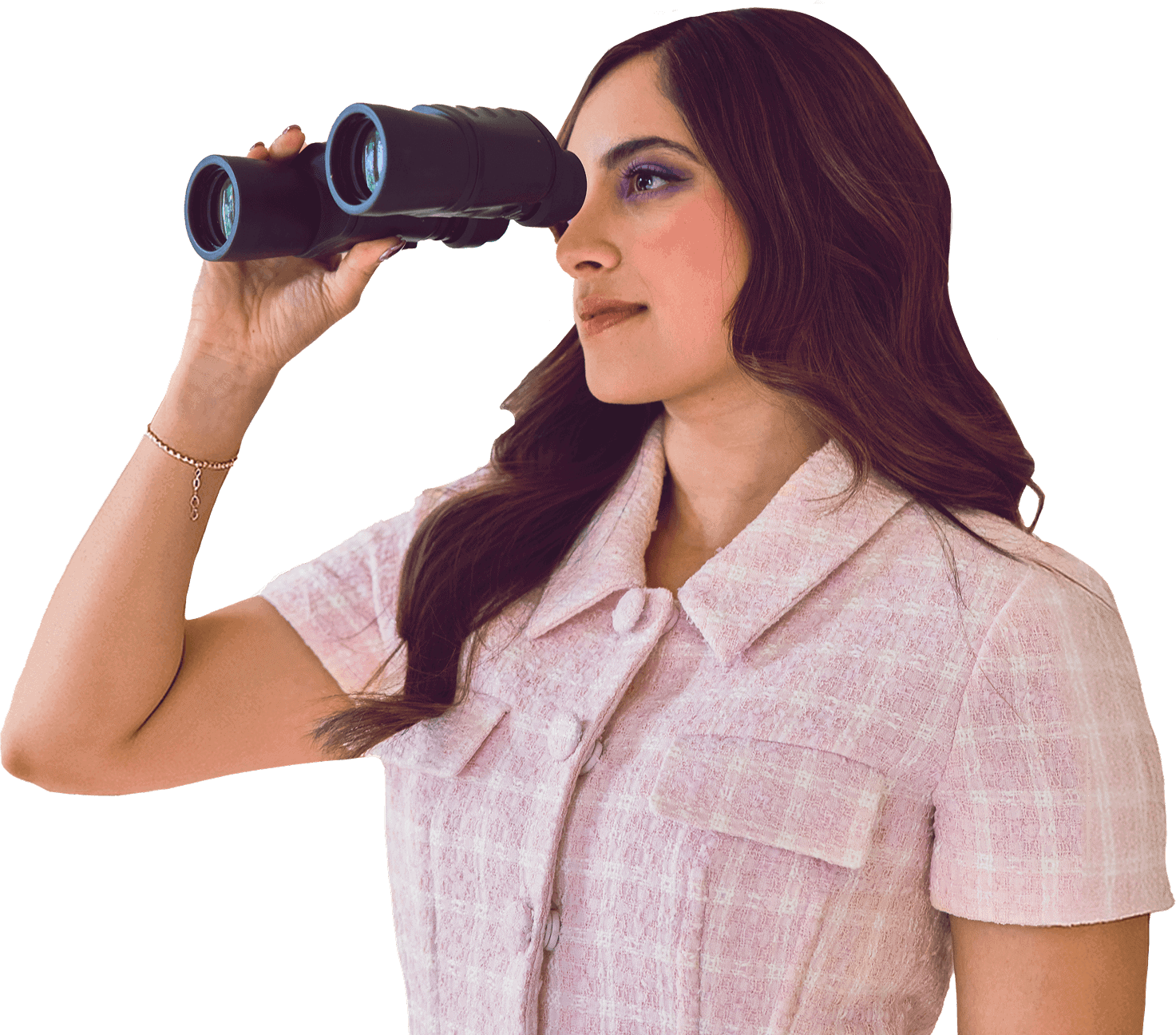 A woman in a pink short-sleeve collared dress is looking through black binoculars, facing to the right.